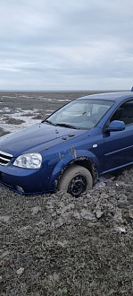 помогите, застряла в грязи около озера эбейты вытащить застрявшую машину Chevrolet lacetti
