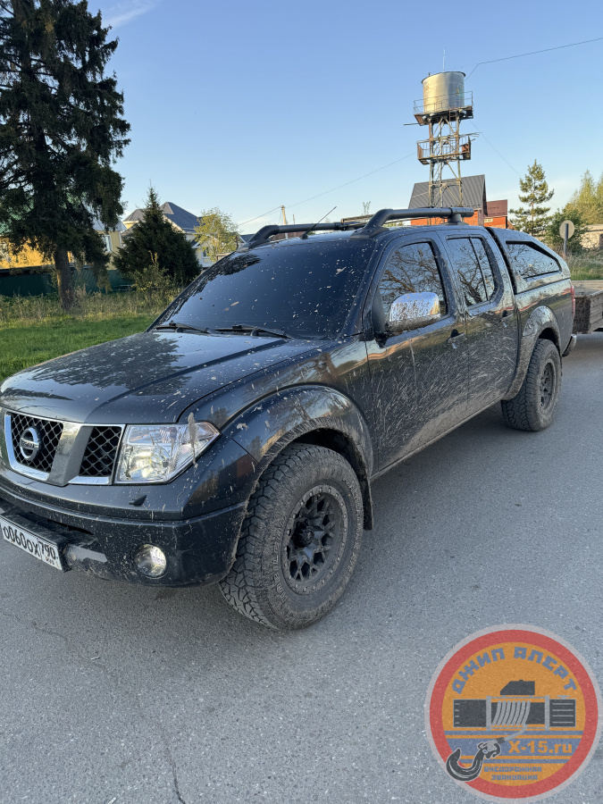 фото застрявшего Nissan navara  Москва