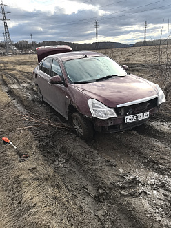 помогите пожалуйста, ездили на речку, застряли в поле по дороге домой вывесило правое колесо вытащить застрявшую машину Nissan Almera G15