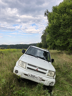 помогите пожалуйста,   вытащить застрявшую машину Pajero IO