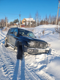помогите, нужно вытащить из снега, съехал левой стороной с дороги вытащить застрявшую машину Tank