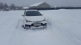 Застрял в поле полтора километра до асфальта. вытащить застрявшую машину Тойота королла.