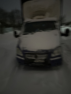 500 метров от асфальта в переулке. вытащить застрявшую машину Газель.