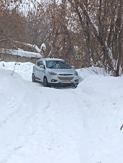 Город Казань застряла на доро на объездной тут дороге. вытащить застрявшую машину Aix 35 hyundai.