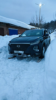 Застрял в населённом пункте в гаражах, в колее снежной до асфальта, до твёрдой поверхности метров 30 40. вытащить застрявшую машину Hyundai Санта-Фе